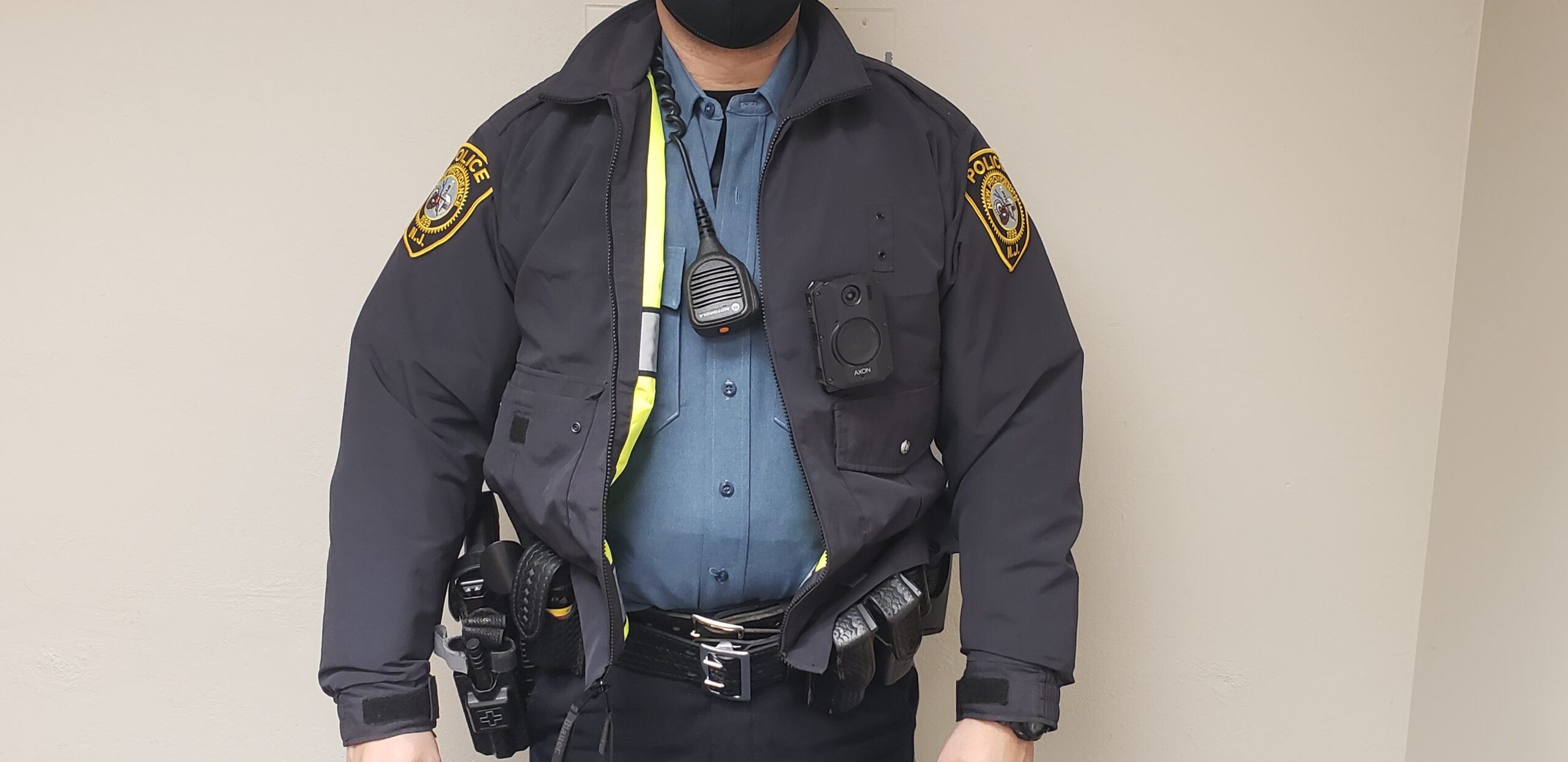 Body Camera with a Police Uniform and Jacket